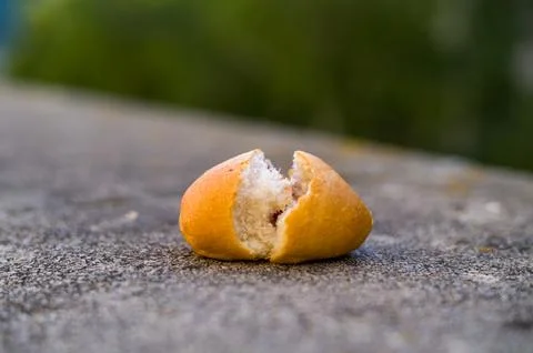 A lonely broken bread roll Foto stock