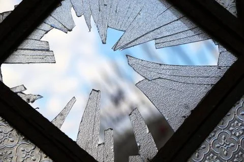 Lonely broken window Stock Photos