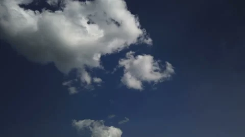 Lonely cirrus clouds in the blue sky Stock Footage 211860817