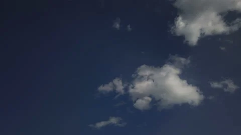 Lonely cirrus clouds in the blue sky Stock Footage 211861744