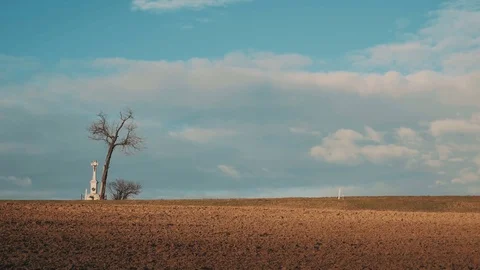 Lonely cross in the field 스톡 동영상 71273842
