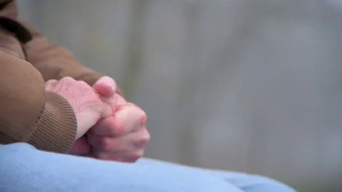 Lonely Elderly Man Rubs Hands Together With Worry Close Stock Footage 147877388