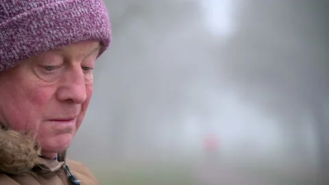 Lonely Elderly Man Sits Alone in Park Close Up Stock Footage 147891864