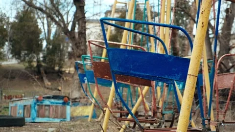 Lonely empty carousel old abandoned amusement park. Loneliness concept of child Stock Footage 151925722
