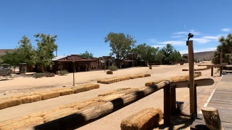 Lonely floating view of the dusty main street of Pioneertown, California. Video stock 113767253