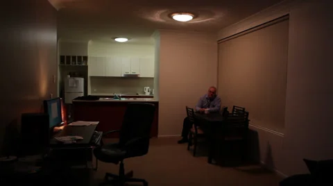 Lonely Guy in Apartment Stock Footage 32983243