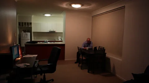 Lonely Guy in Apartment Stock Footage 32998636
