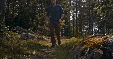 Lonely hiker jogging towards the camera Stock Footage 111633892