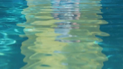 Lonely hipster man sits on diving board at pool with bag over his head Stock Footage 108942653