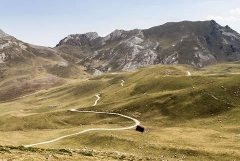 Lonely House at a Mountain Range Stock Photos