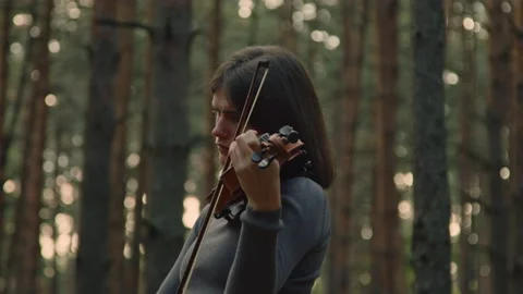 Lonely Lady Is Playing Violin Stock Footage 164067729