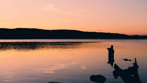 A lonely lake with a sunset 스톡 동영상 96748072