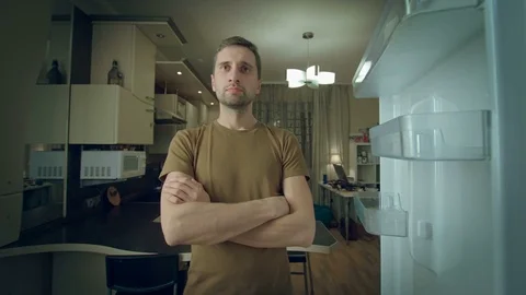 Lonely man and the empty fridge Stock Footage 82448230