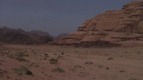 Lonely man in desert Stock Footage 8722863