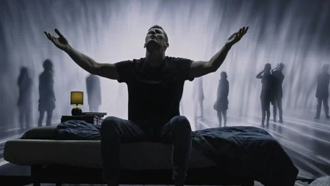 Lonely Man Experiencing Haunting Nightmare Dark Figures Eerie Shadows Fear Stock Footage 288880354