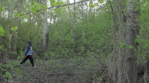 Lonely man in the forest Stock Footage 62834716