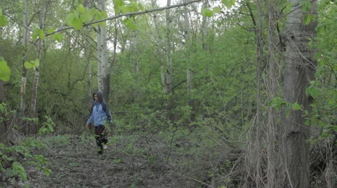 Lonely man in the forest Stock Footage 62835400