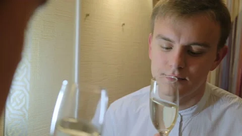 Lonely man with a glass by the mirror, closeup Stock Footage 126861418