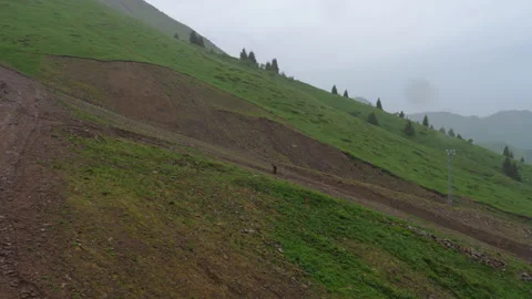 A lonely man high in the mountains Video stock 309278430