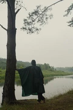 The Lonely Man in the Raincoat Foto stock