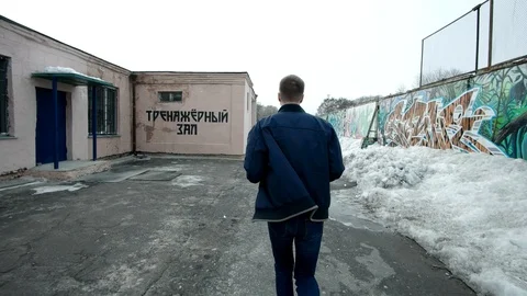 Lonely man running forward, back view. slow motion shot at 60fps Stock Footage 88179827