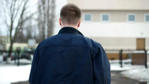 Lonely man running forward, back view. slow motion shot at 60fps Stock Footage 88179829