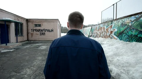 Lonely man running forward, back view. slow motion shot at 60fps Stock Footage 88179879