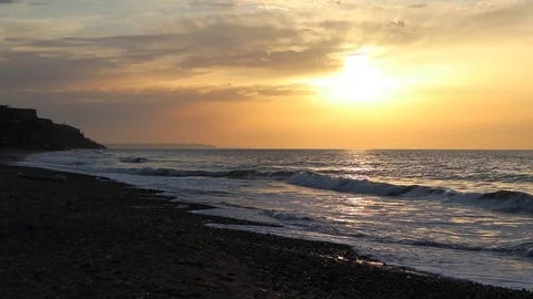 Lonely man walking on beach early morning at sunrise. Stock Footage 126702168