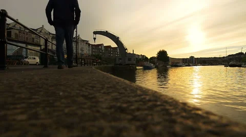 Lonely man walking on the dock of the harbor Video stock 54071215