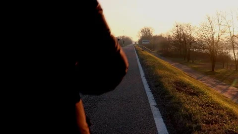 A lonely man walking on the road Stock Footage 122649826