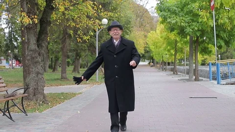 Lonely man walking through empty city Stock Video Pond5