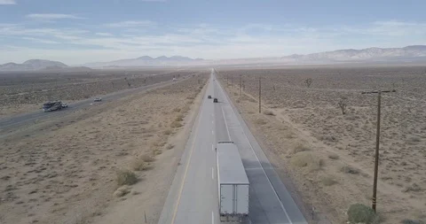 Lonely Mojave Highway Forward Drone Shot Stock Footage 99888415