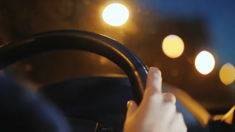 Lonely in the night. The driver is driving around the city at night, the lights Stock Footage 80086871