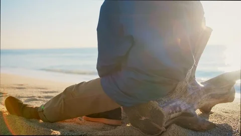 Lonely nostalgic making picture or photo in beach sunrise or sunset sky and sea Stock Footage 100898250