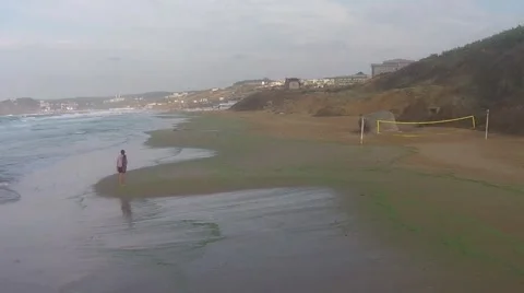 A lonely person on the beach Stock Footage 43087116