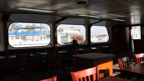 Lonely person on a boat Stock Footage 83035542