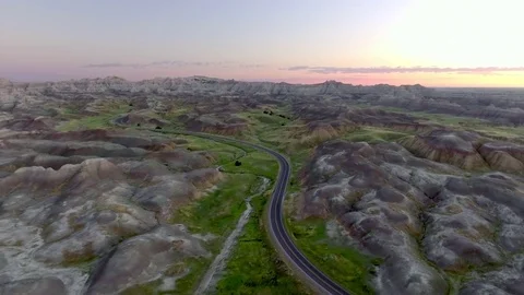 Lonely Road Cuts through Mountains of Badlands Stock-Footage 75913503