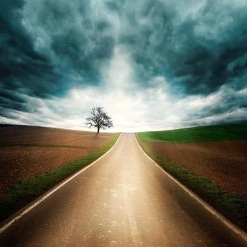 Lonely road with dramatic mood Stock Photos