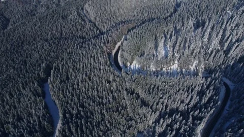 Lonely road in the mountains during winter Stock Footage 328412079