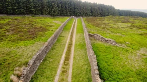 Lonely road through Peak district moors in Yorkshire Stock-Footage 338024089