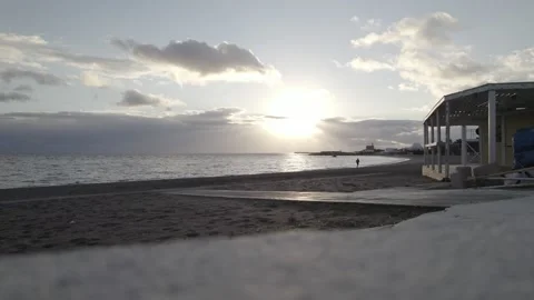 The lonely runner at the beach Video stock 169759036