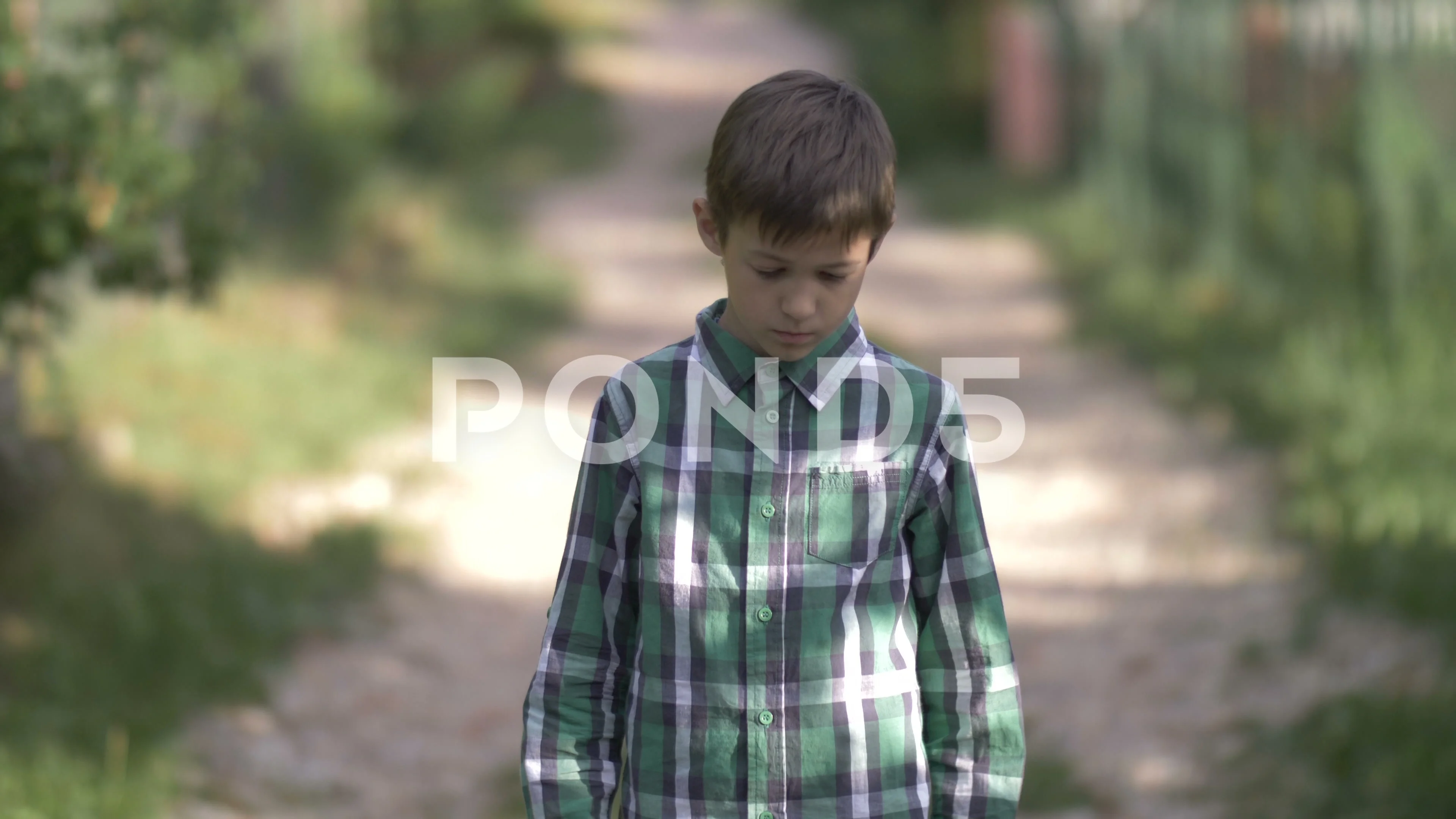 lonely kid walking