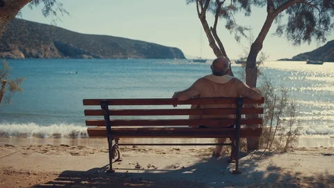 A%20lonely%20sad%20old%20man%20relaxes%20on%20a%20bench%20...%20|%20Stock%20Video%20|%20Pond5