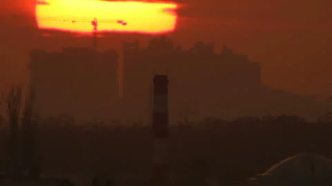 Lonely smokestack in the sunset Stock Footage 90019277