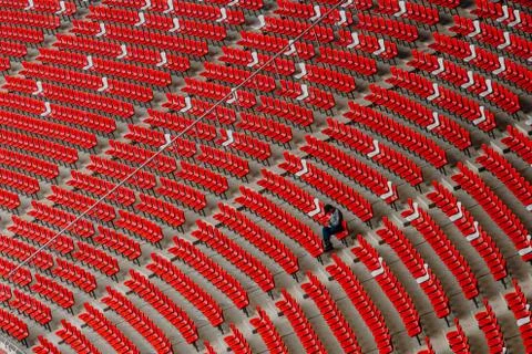 Lonely spectator in the stadium Stock Photos