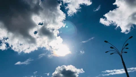 Lonely streetlight &amp; clouds &amp; sun Stock Footage 154959925