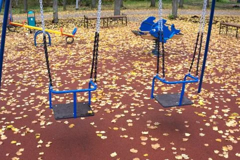 Lonely swing on the beach . Stock Photos