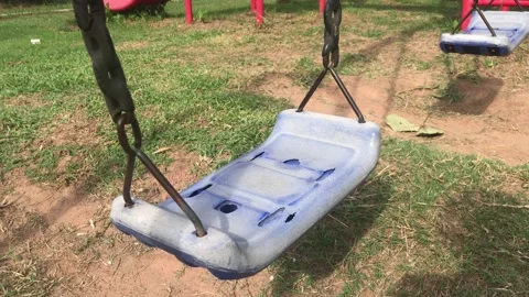 Lonely swing in park Stock Footage 157551408