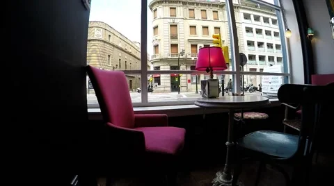 Lonely table in cafe with big window and city Stock Footage 48469538