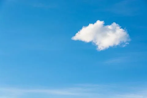 Lonely white cloud light blue sky background Stock Photos